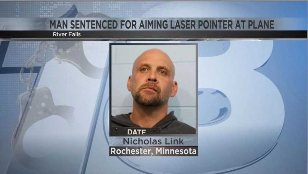 man behind bars for pointing laser at airplane